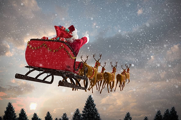 images of santa and reindeer flying