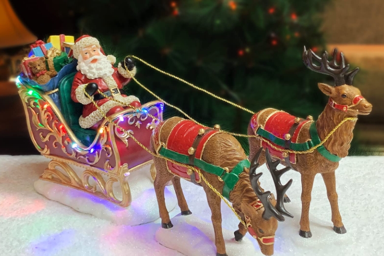 picture of santa in sleigh with reindeer