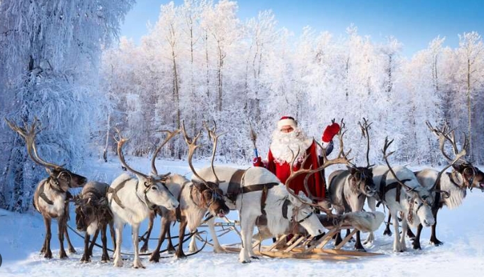 picture of santa claus and his reindeer